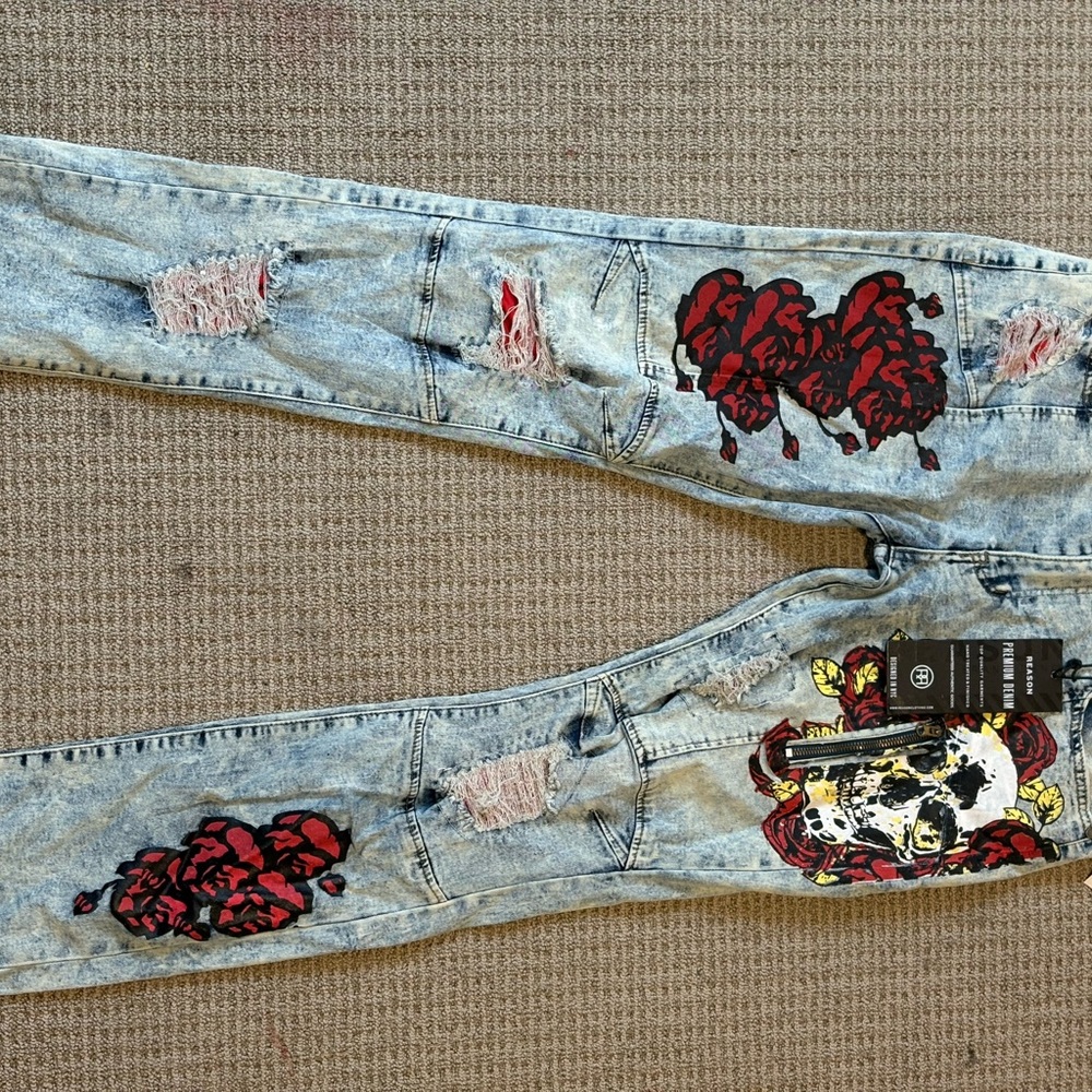 Distressed Light Blue Jeans with Red Floral Design
